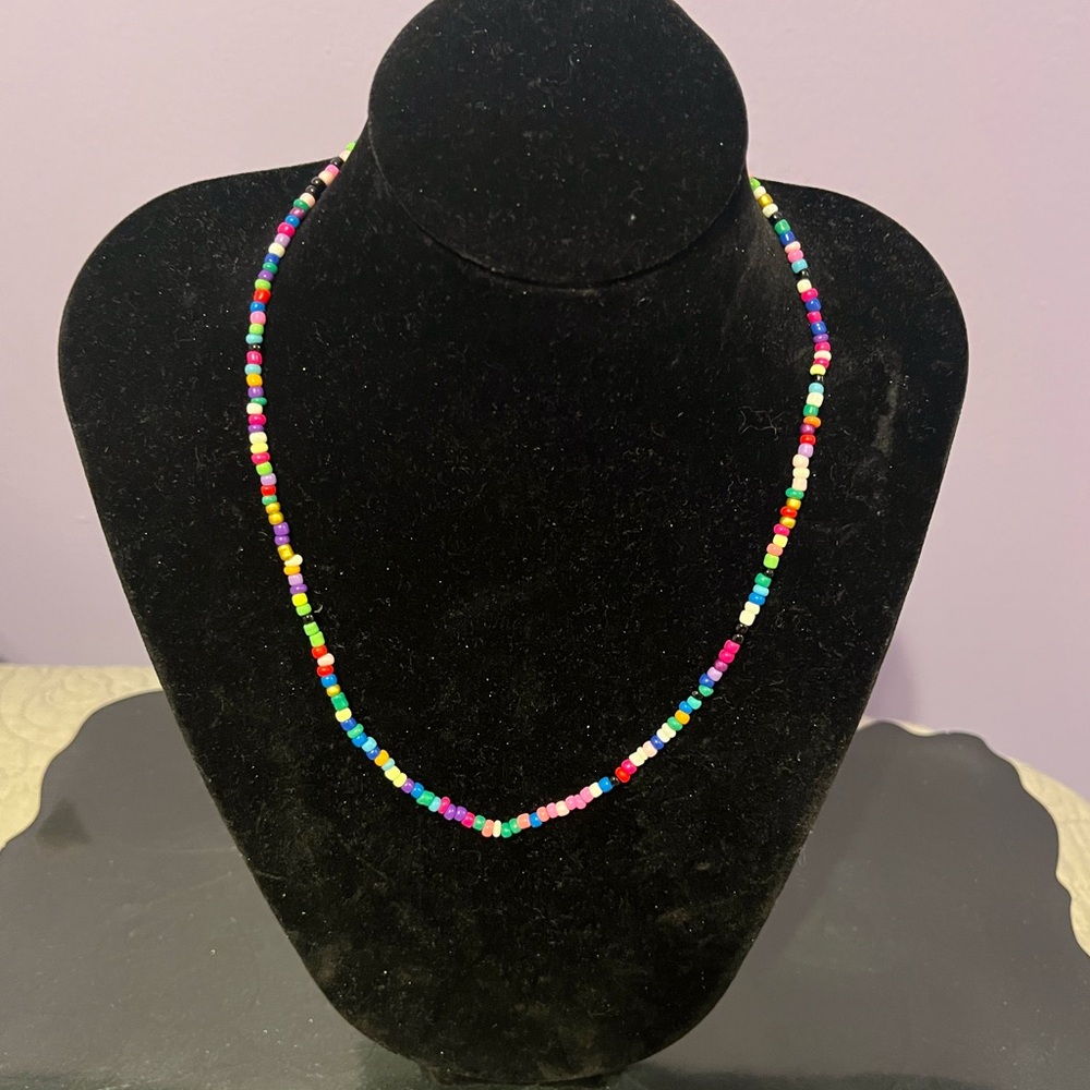 Multi colored beaded necklace. Approximately 16”.